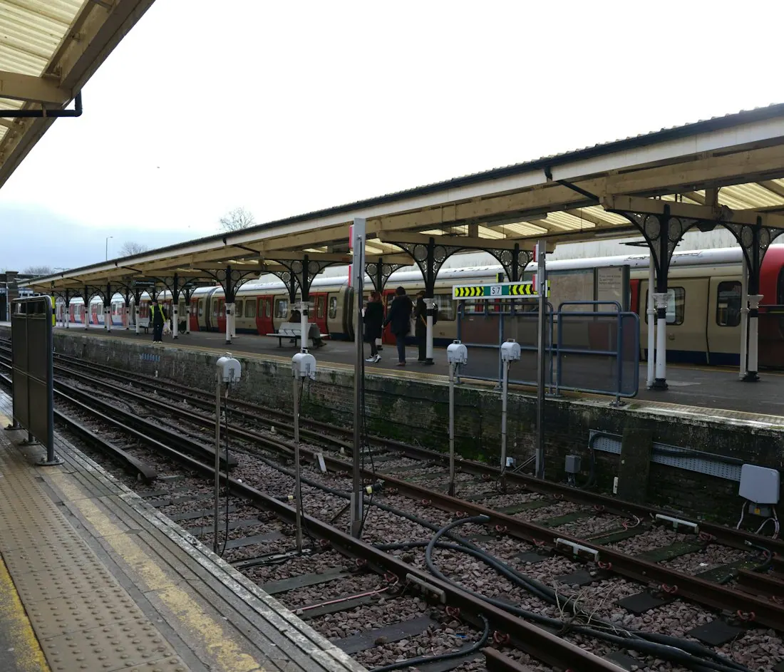 Railway tracks beside covered station platforms